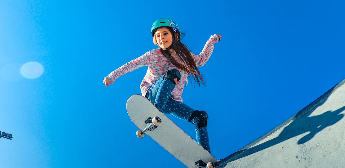 Stuent with her skate board